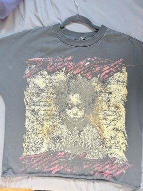 Vintage-Style Black Short Sleeve Tee with Yellow & Pink Graphic